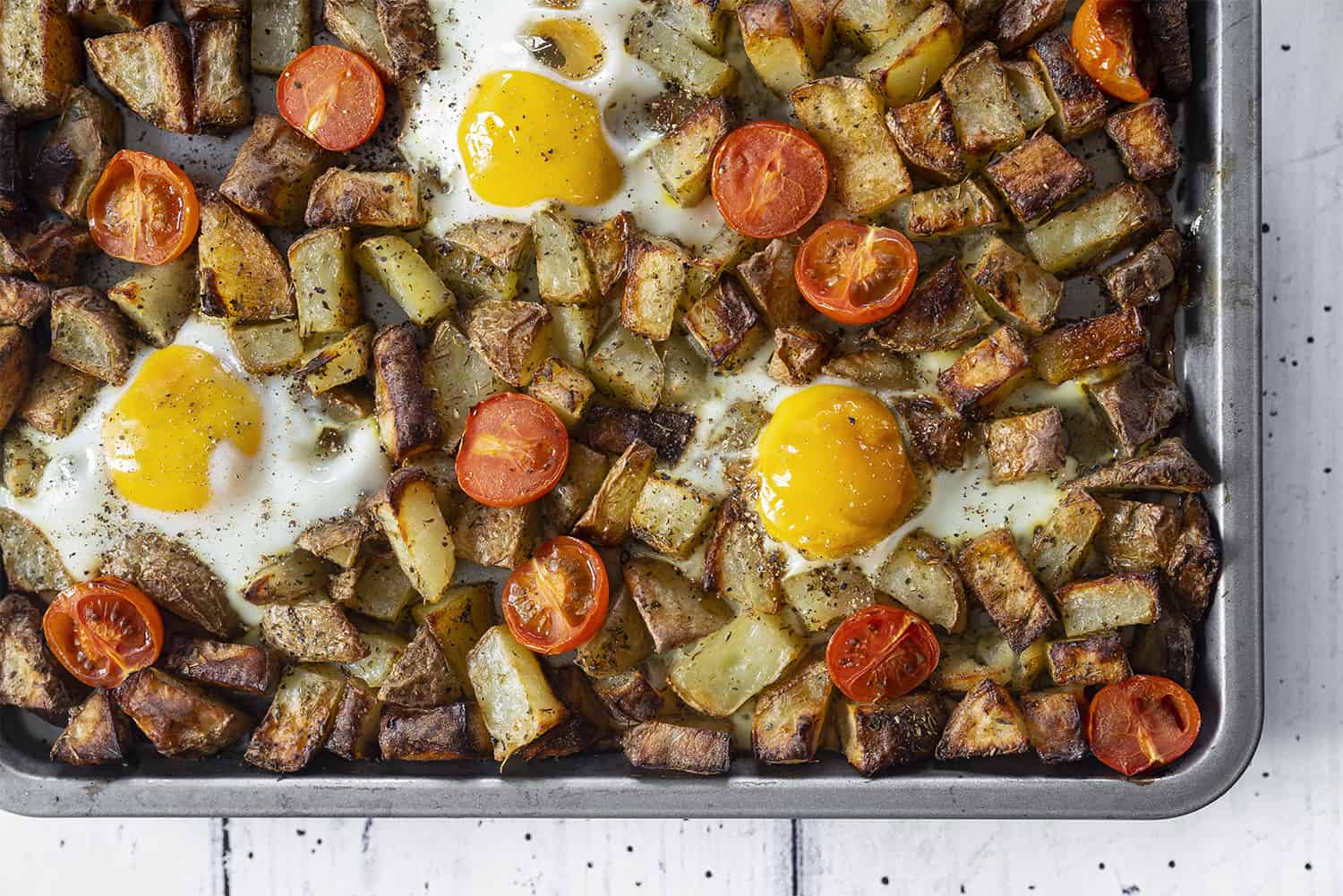 Baked Egg and Tomato Hash Traybake Recipe (dairy free, low FODMAP)