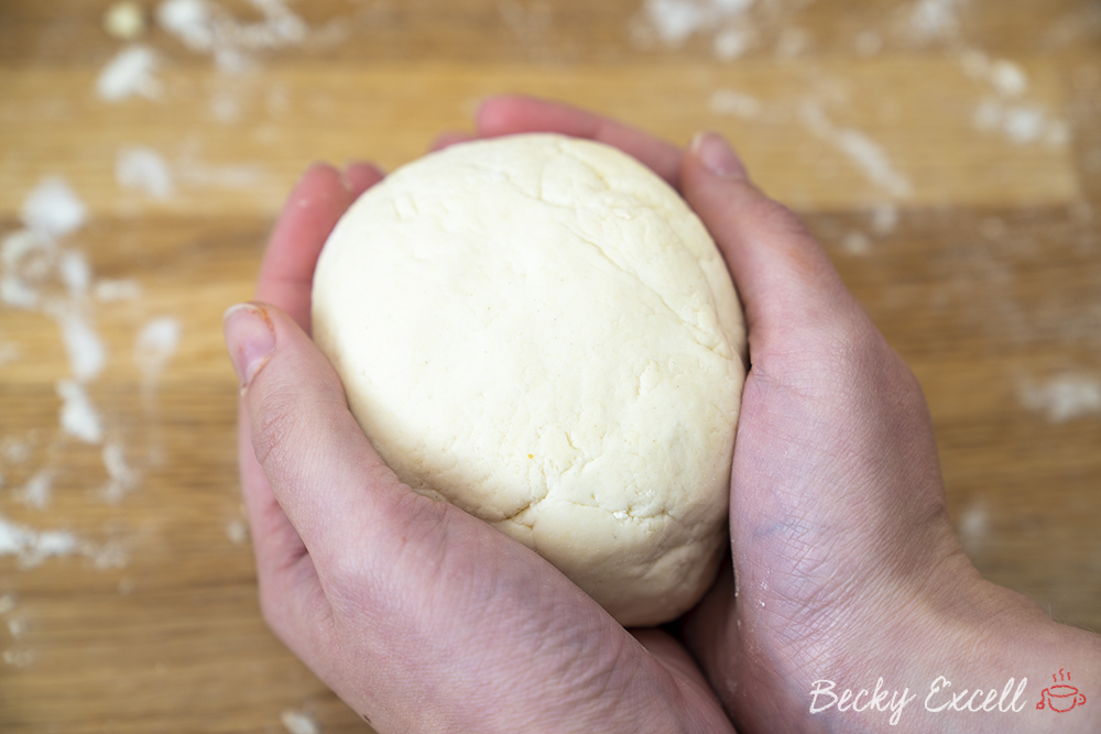 Roll your gluten free pizza dough until it comes together into a ball