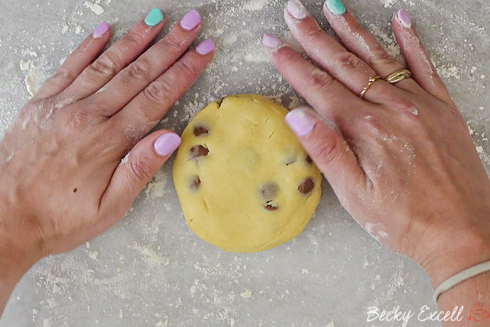 Place the shortbread dough onto a floured surface.