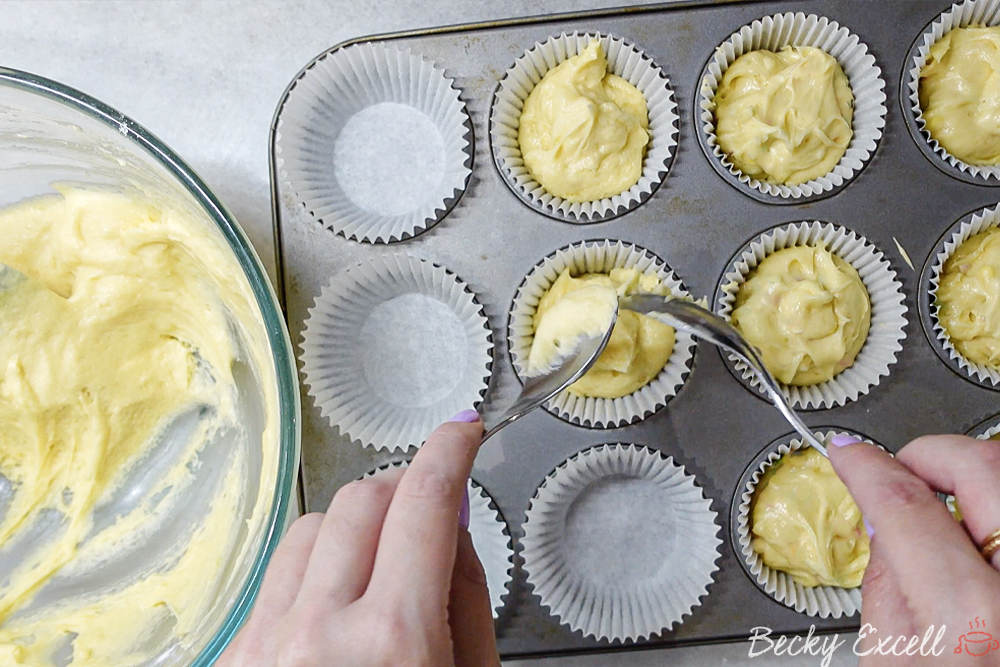 Gluten-free Vanilla Cupcakes Recipe: Carefully spoon your cake batter into your cupcake cases.