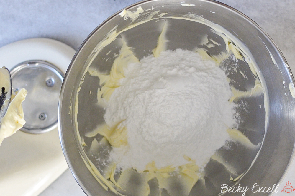 Gluten-free Vanilla Cupcakes Recipe: Add your icing sugar next in stages to avoid creating a mess when the mixer is turned on.