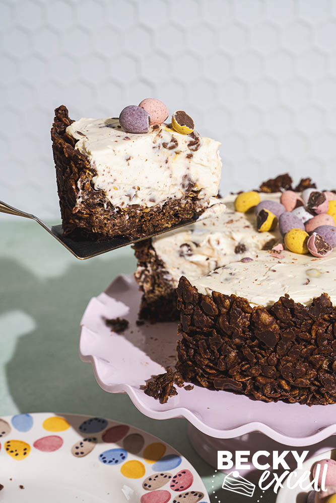 Serving up a slice and showing the crispy chocolate cornflake base