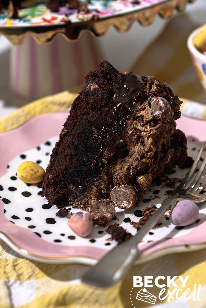 One slice serving of the warmed finished cake with gooey ganache
