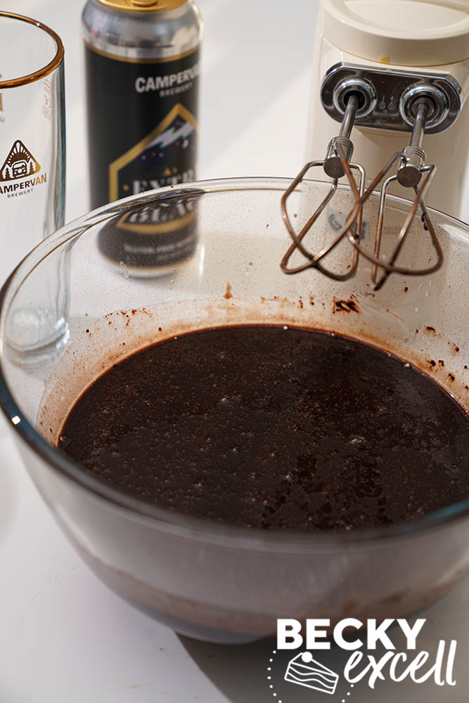 The cake batter after being mixed with an electric hand whisk