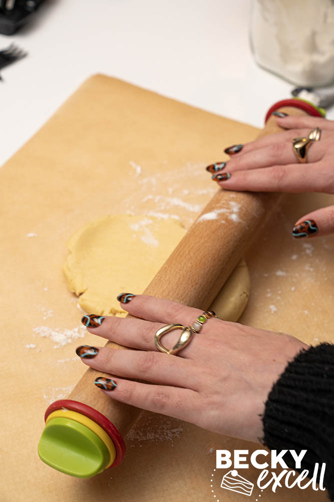 Roll out the dough. If at a good temperature, it should roll easily, yet not be sticky.