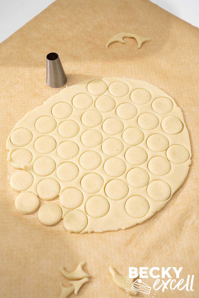 cutting 2cm-ish shapes out of the dough but before removing the excess dough scraps which will be rerolled